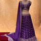 ( DELIVERY IN 15-20 DAYS ) PURPLE COLOUR CHINON LEHENGA WITH CROP TOP BLOUSE EMBELLISHED WITH CUTDANA, SEQUINS & ZARI WORK