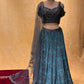 BLUE COLOR CHINON LEHENGA WITH CROP TOP BLOUSE & NET DUPATTA EMBELLISHED WITH SEQUINS WORK