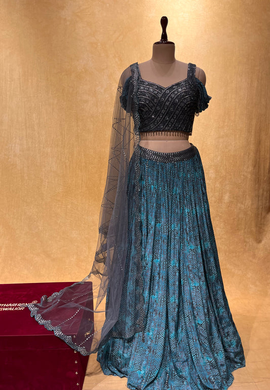 BLUE COLOR CHINON LEHENGA WITH CROP TOP BLOUSE & NET DUPATTA EMBELLISHED WITH SEQUINS WORK