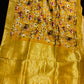 MUSTARD YELLOW PRINTED PLANT-BASED SILK SAREE WITH BANARASI ZARI BOOTIES AND HEAVY PALLA