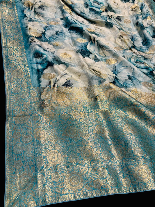 GREYISH TEAL COLOUR PRINTED PLANT-BASED SILK SAREE WITH BANARASI ZARI BOOTIES AND HEAVY PALLA