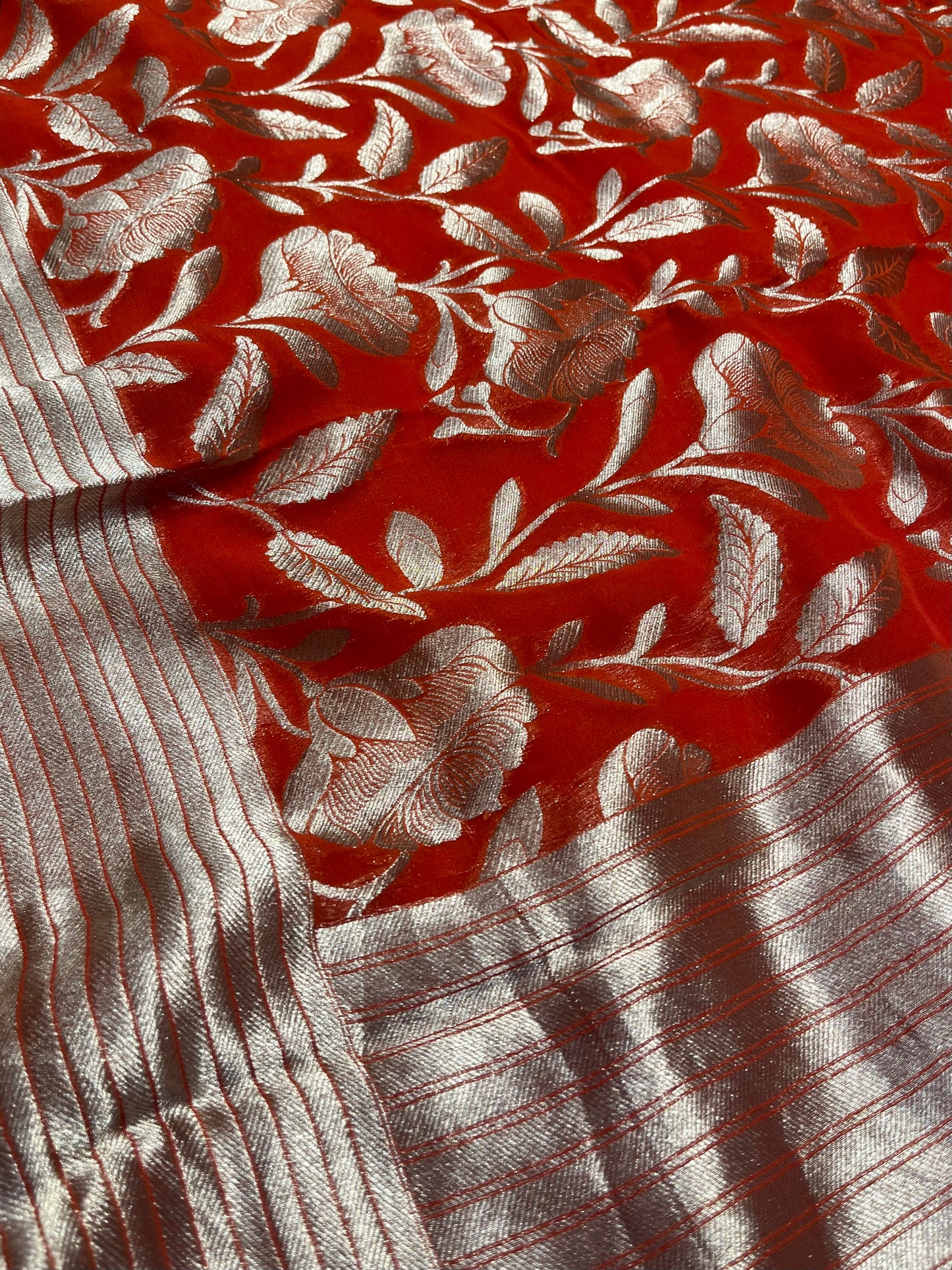 ORANGE COLOUR GEORGETTE SAREE EMBELLISHED WITH ZARI WEAVES - Kothari Sons