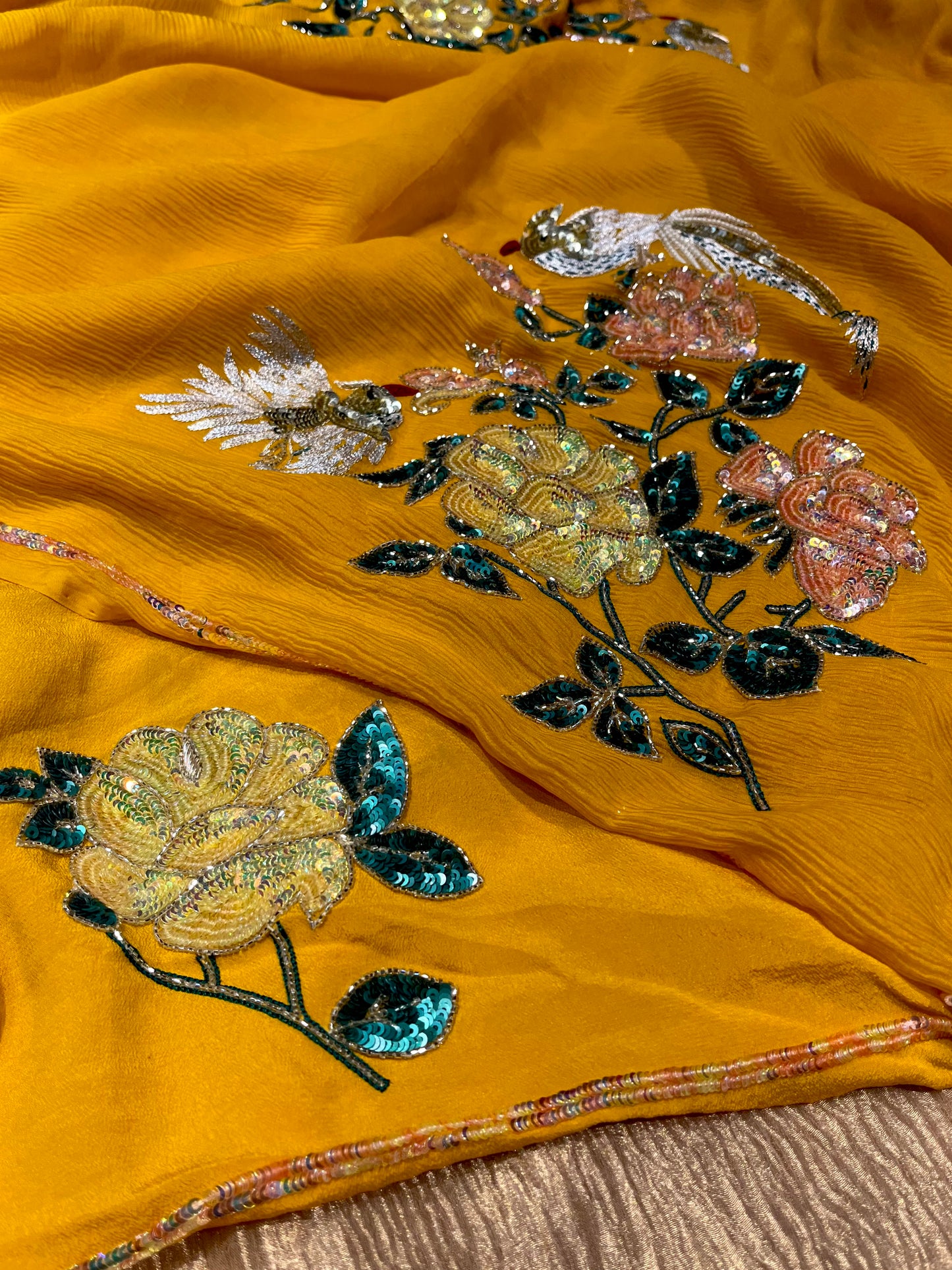 YELLOW COLOUR PURE CHIFFON HAND EMBROIDERED SAREE EMBELLISHED WITH SEQUINS KARDHANA & ZARI WORK