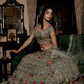 SEA GREEN COLOUR NET HAND EMBROIDERED NET LEHENGA EMBELLISHED WITH SEQUINS, ZARI & MIRROR WORK