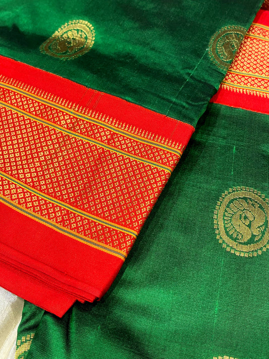 BOTTLE GREEN COLOUR PURE SILK PAITHANI SAREE EMBELLISHED WITH CONTRAST BORDER & PALLA EMBELLISHED WITH ZARI WEAVES