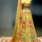 PISTA GREEN COLOUR PRINTED SILK LEHENGA WITH UNSTITCHED BLOUSE EMBELLISHED WITH CUTDANA & SEQUINS WORK