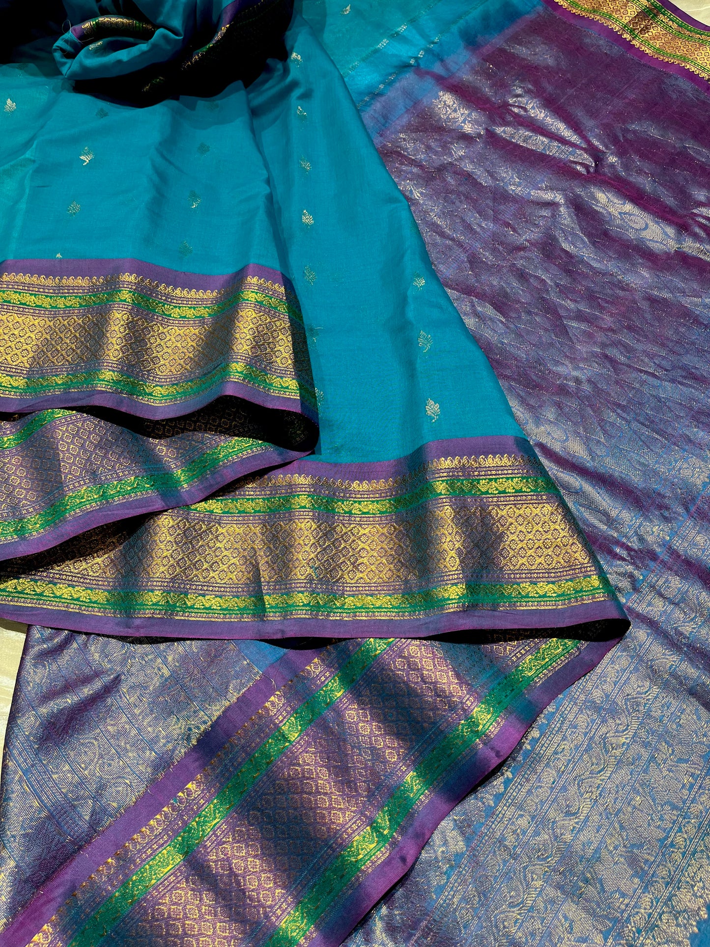 TURQUOISE COLOUR PURE GADWAL SILK SAREE EMBELLISHED WITH ZARI WEAVES