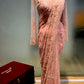 PINK COLOUR NET EMBROIDERED SAREE WITH READYMADE BLOUSE EMBELLISHED WITH CUTDANA, & BEADS WORK