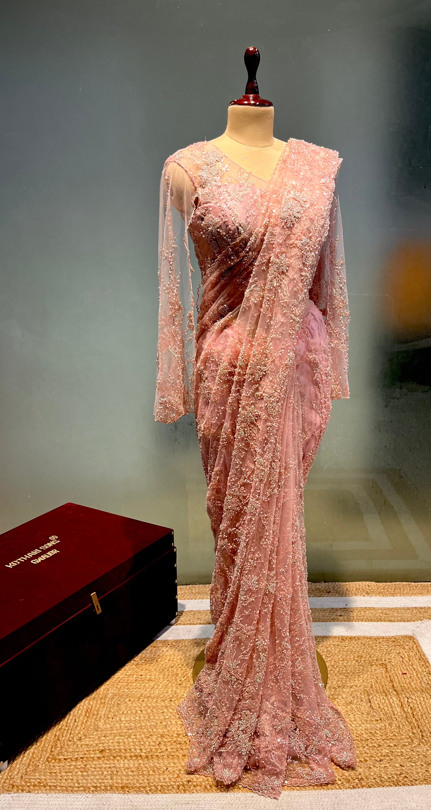 PINK COLOUR NET EMBROIDERED SAREE WITH READYMADE BLOUSE EMBELLISHED WITH CUTDANA, & BEADS WORK