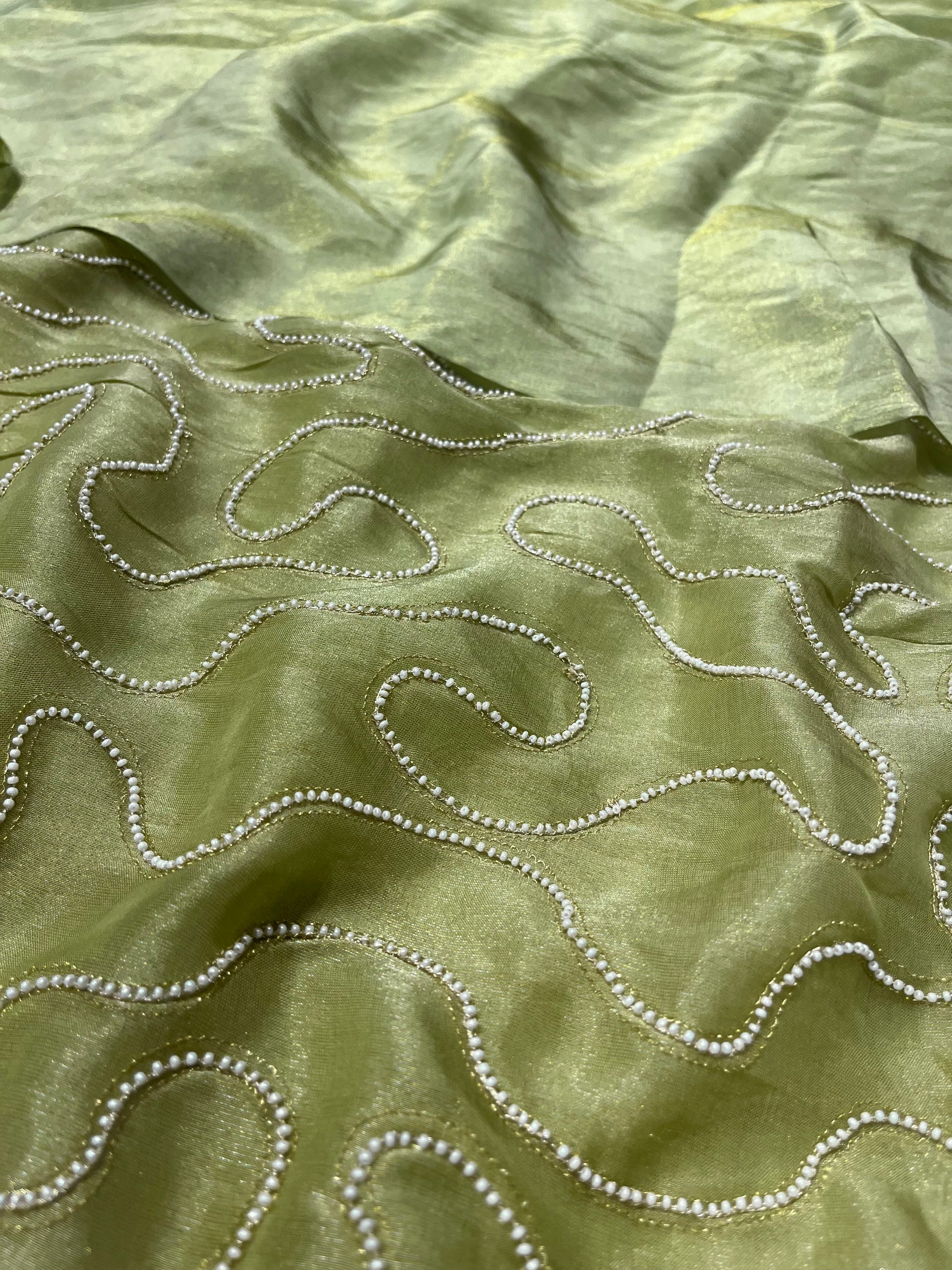 PISTA GREEN COLOUR TISSUE GEORGETTE SAREE WITH PEARL EMBROIDERED UNSTITCHED BLOUSE BY SIDDHAIKA - Kothari Sons