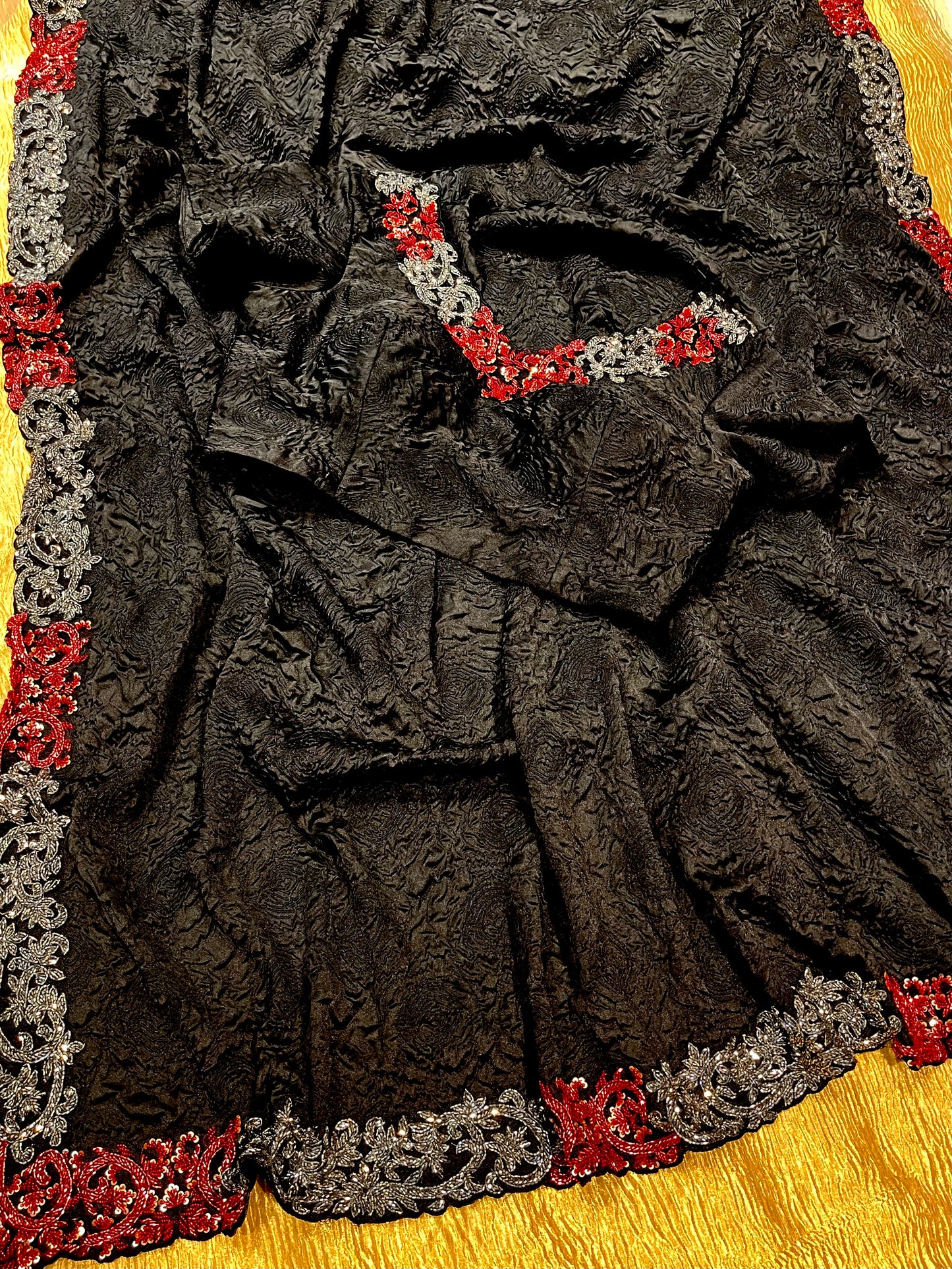 BLACK COLOUR SATIN EMBOSSED PRINT SAREE WITH READYMADE BLOUSE EMBELLISHED WITH CUTDANA WORK