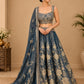 STEEL BLUE COLOUR GEORGETTE TISSUE BANARASI LEHENGA WITH EMBROIDERED CROP TOP EMBELLISHED WITH CUTDANA & SEQUINS WORK