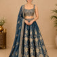 STEEL BLUE COLOUR GEORGETTE TISSUE BANARASI LEHENGA WITH EMBROIDERED CROP TOP EMBELLISHED WITH CUTDANA & SEQUINS WORK