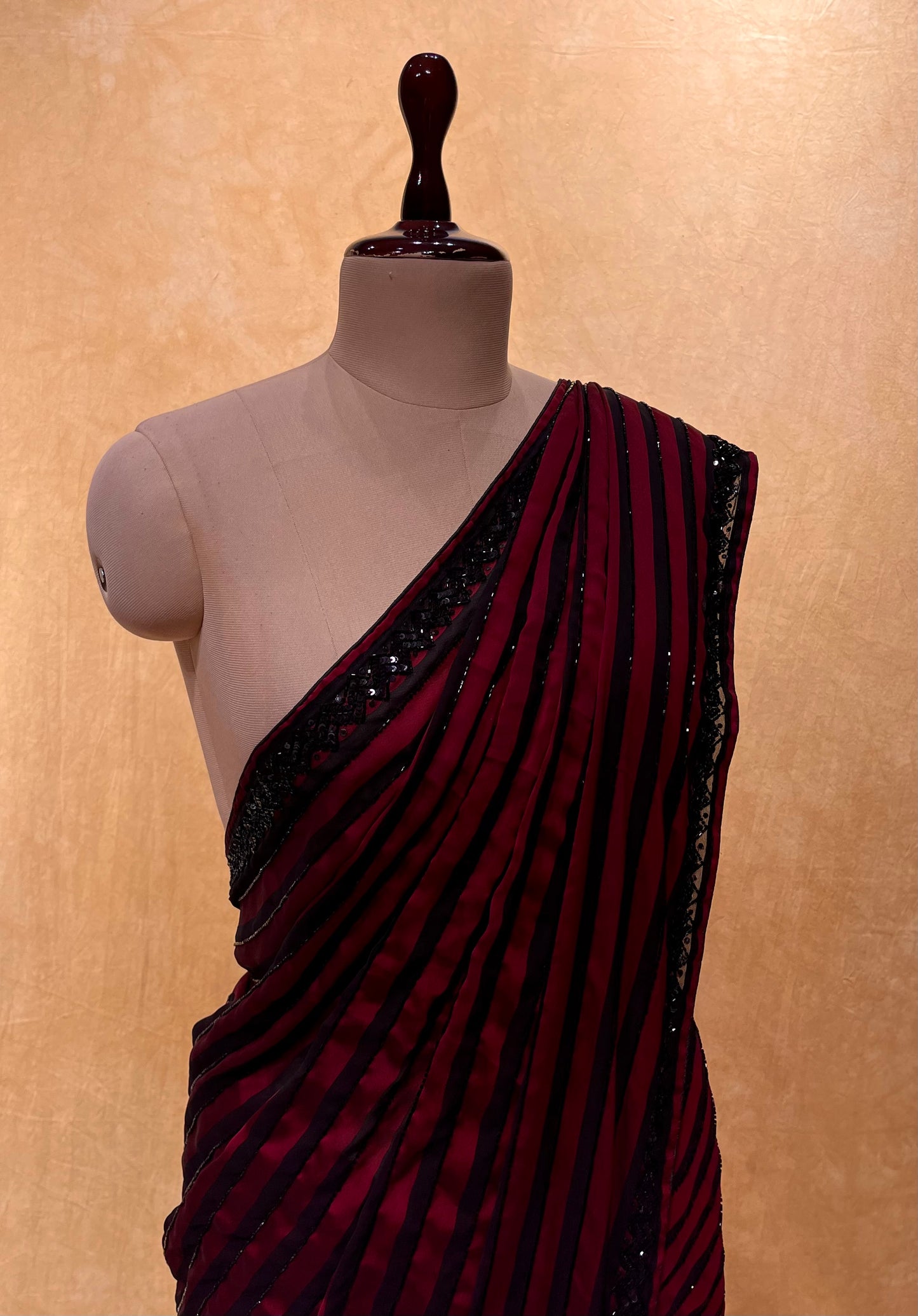BLACK & MAROON COLOUR GEORGETTE SATIN STRIPED EMBROIDERED SAREE EMBELLISHED WITH CUTDANA WORK