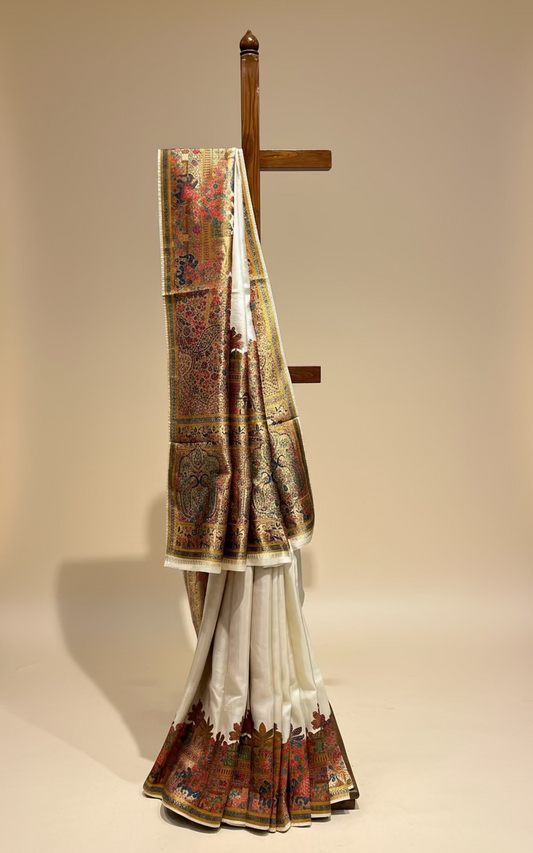 IVORY COLOUR WOVEN PICHWAI ART PLANT-BASED SILK SAREE WITH RICH ZARI WORK IN BORDER, PALLA AND BLOUSE