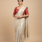 IVORY COLOUR ZARI WOVEN JAAL PLANT-BASED SILK SAREE WITH READYMADE RANI COLOUR KASHMIRI KANI BLOUSE