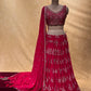 DARK PINK COLOR GEORGETTE EMBROIDERED LEHENGA WITH CROP TOP BLOUSE EMBELLISHED WITH MIRROR & ZARI WORK