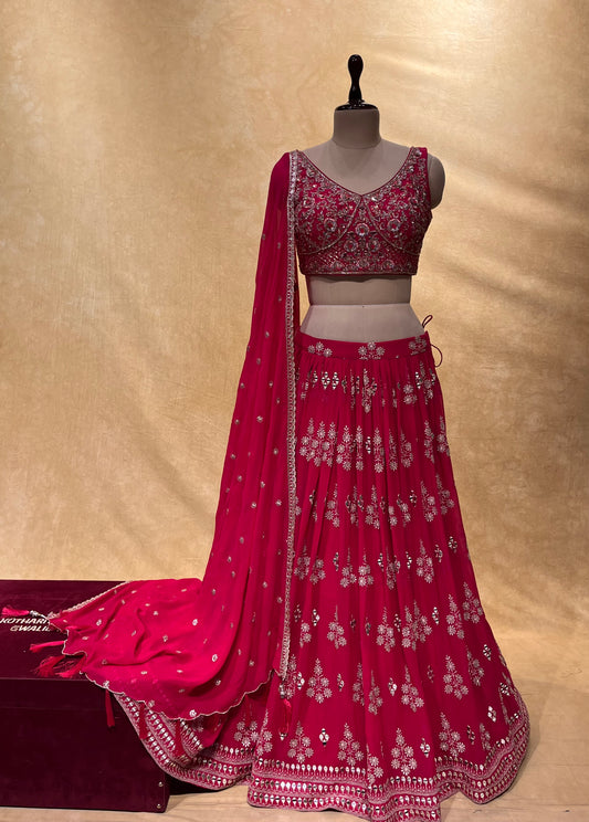 DARK PINK COLOR GEORGETTE EMBROIDERED LEHENGA WITH CROP TOP BLOUSE EMBELLISHED WITH MIRROR & ZARI WORK