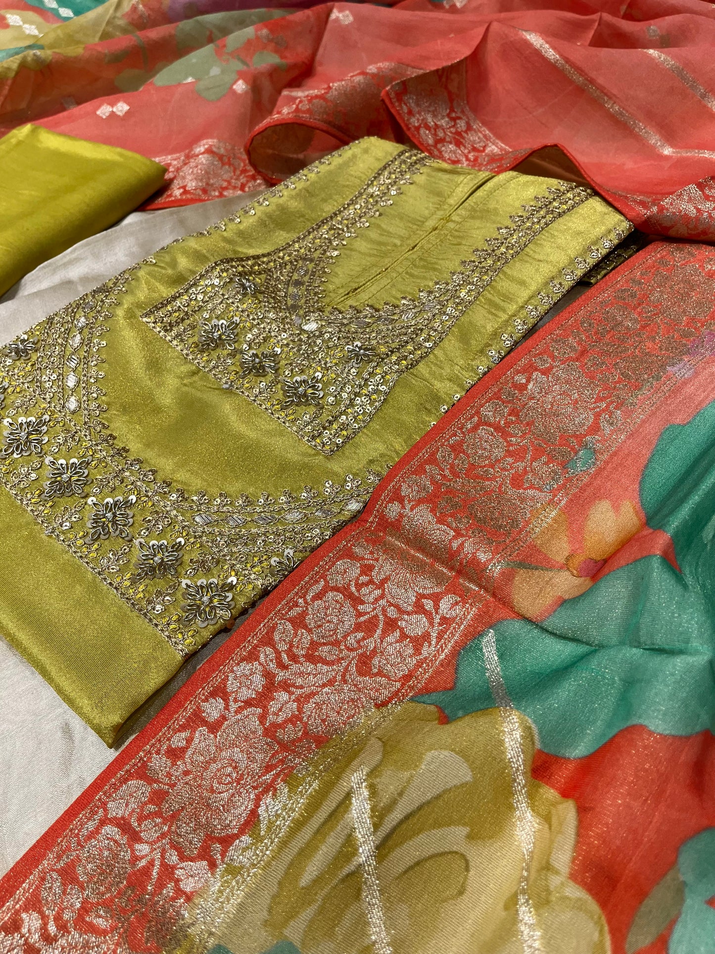 GREEN COLOUR CREPE TISSUE UNSTITCHED SUIT WITH ORGANZA DUPATTA EMBELLISHED WITH ZARDOZI & SEQUINS WORK