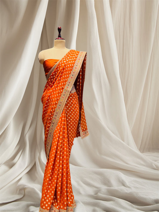 Rust Orange Khaddi Georgette Saree With Dori/ Sequins/ Resham embroidered attach border & silk blose