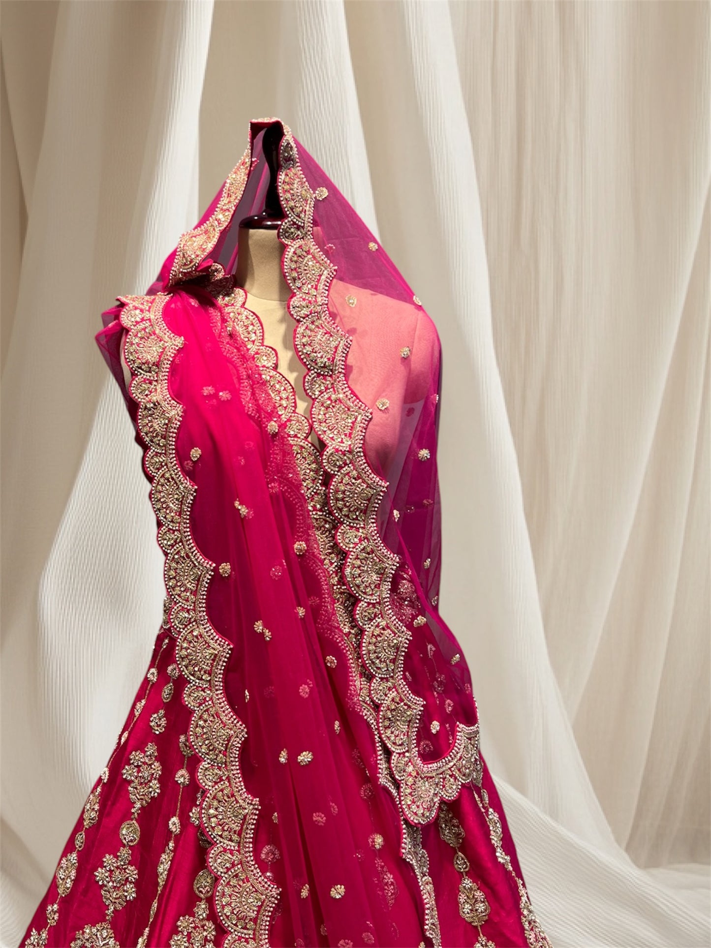 Magenta Colour  Silk lehenga with net dupatta embellished with beads , pips and zari Embroidered Bridal Lehenga