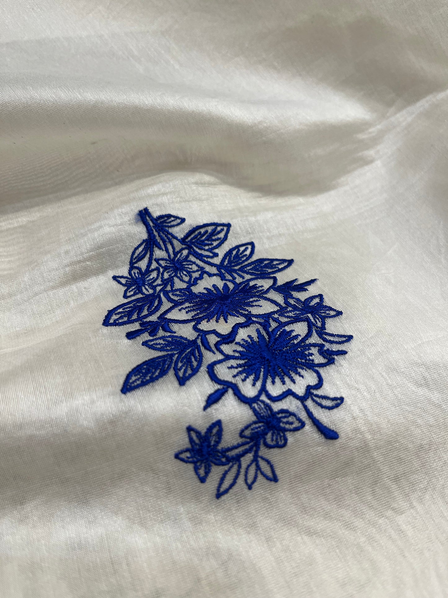 WHITE COLOUR CHANDERI SCALLOP BORDER EMBROIDERED SAREE EMBELLISHED WITH RESHAM EMBROIDERY BY SIDDHAIKA - Kothari Sons