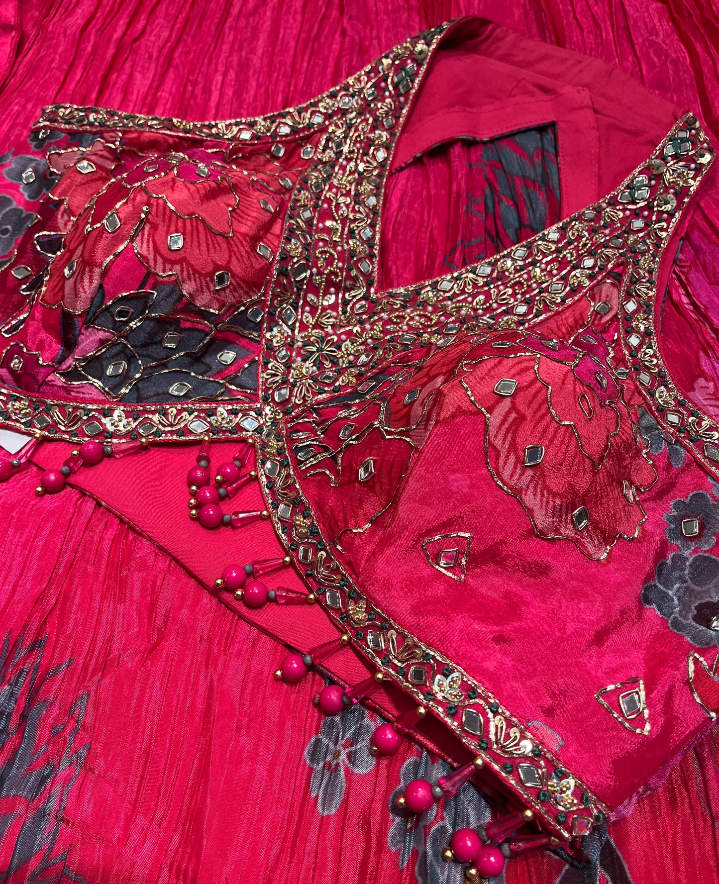 HOT PINK COLOUR CREPE SILK LEHENGA WITH EMBROIDERED BLOUSE EMBELLISHED WITH MIRROR & ZARDOZI WORK