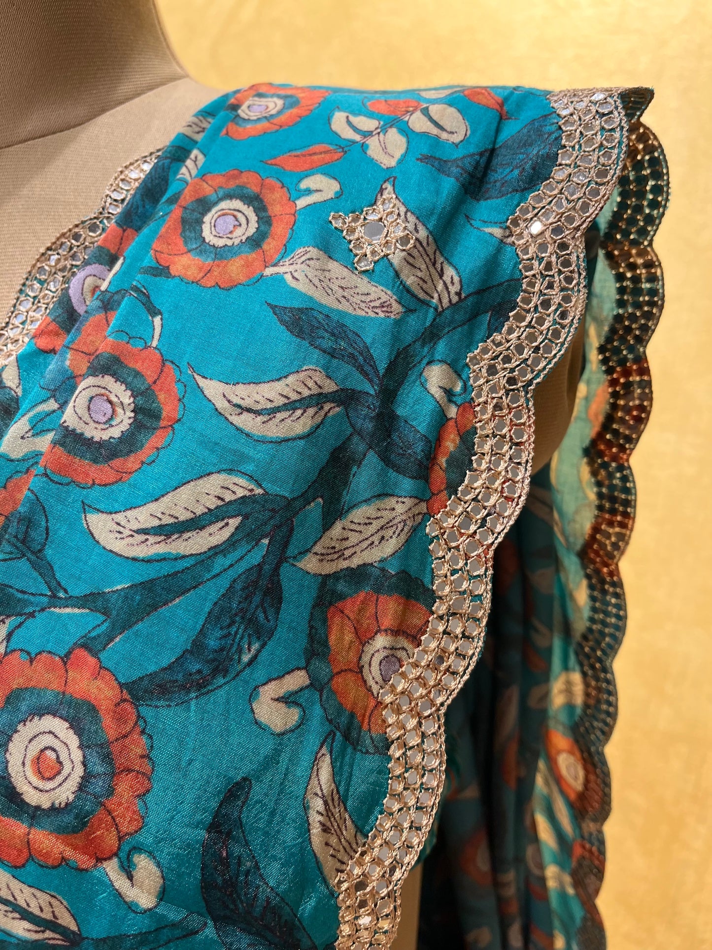 TURQUOISE COLOUR MUSLIN SILK SAREE EMBELLISHED WITH MIRROR FOIL WORK