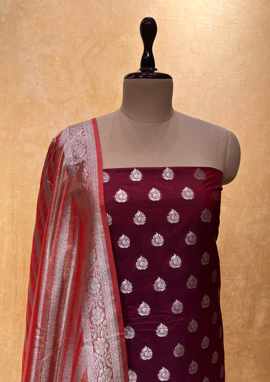 WINE COLOR BANARASI PURE SILK UNSTITCHED SUIT EMBELLISHED WITH ZARI WEAVES