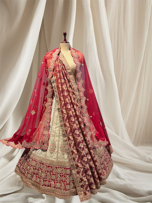 Ivory colour silk brocade lehenga embellished with beads and zari work one net and one brocade dupatta