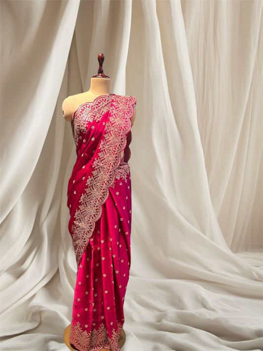 MAGENTA COLOUR SATIN  SAREE EMBELLISHED WITH THREAD AND SEQUINES SCULP BORDER