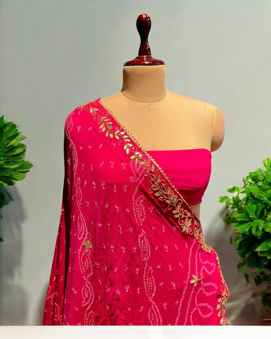 RANI PINK COLOUR GEORGETTE OJARIYA BANDHANI LEHENGA WITH UNSTITCHED BLOUSE EMBELLISHED WITH GOTA PATTI WORK