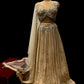 IVORY COLOUR GEORGETTE SKIRT WITH READYMADE CROP-TOP & NET DUPATTA EMBELLISHED WITH KARDHANA BEADS & SEQUINS WORK