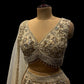 IVORY COLOUR GEORGETTE SKIRT WITH READYMADE CROP-TOP & NET DUPATTA EMBELLISHED WITH KARDHANA BEADS & SEQUINS WORK