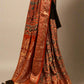 BLACK/RUST CONTRAST AJRAKH PRINT SAREE WITH RUST AJRAKH BLOUSE AND RICH BANARASI PALLA & BORDER IN PLANT-BASED SILK