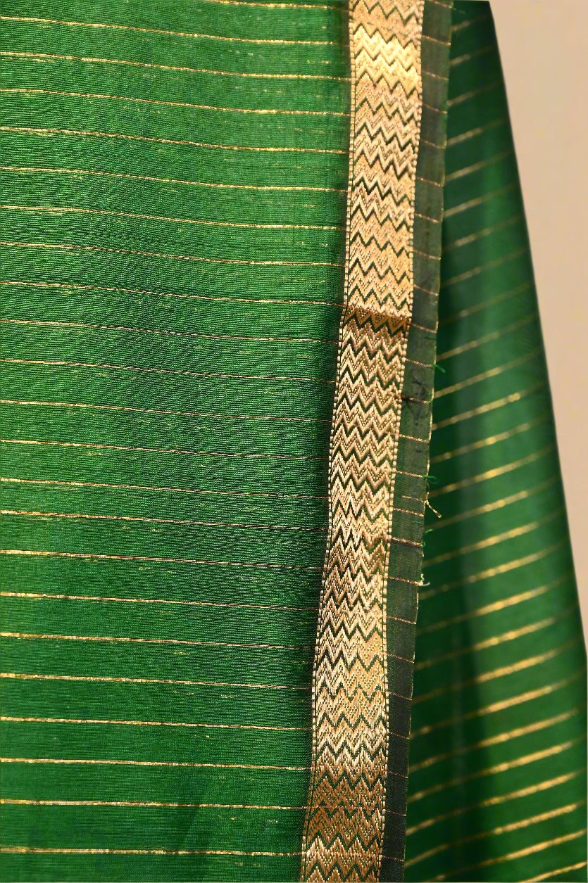 BOTTLE GREEN HANDWOVEN MAHESHWARI SAREE WITH VERTICAL ZARI STRIPE WEAVE