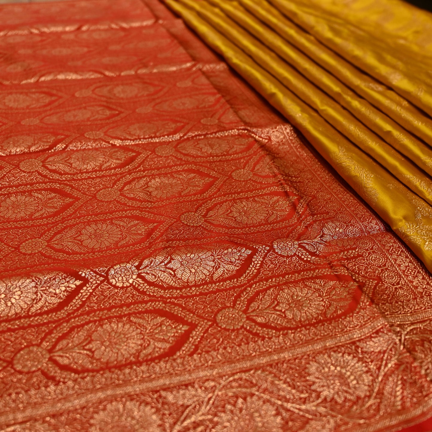 MUSTARD COLOUR BANARASI SATIN SAREE WITH CONTRAST RED BORDER PALLA & BLOUSE