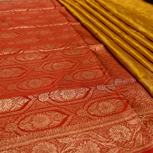 MUSTARD COLOUR BANARASI SATIN SAREE WITH CONTRAST RED BORDER PALLA & BLOUSE
