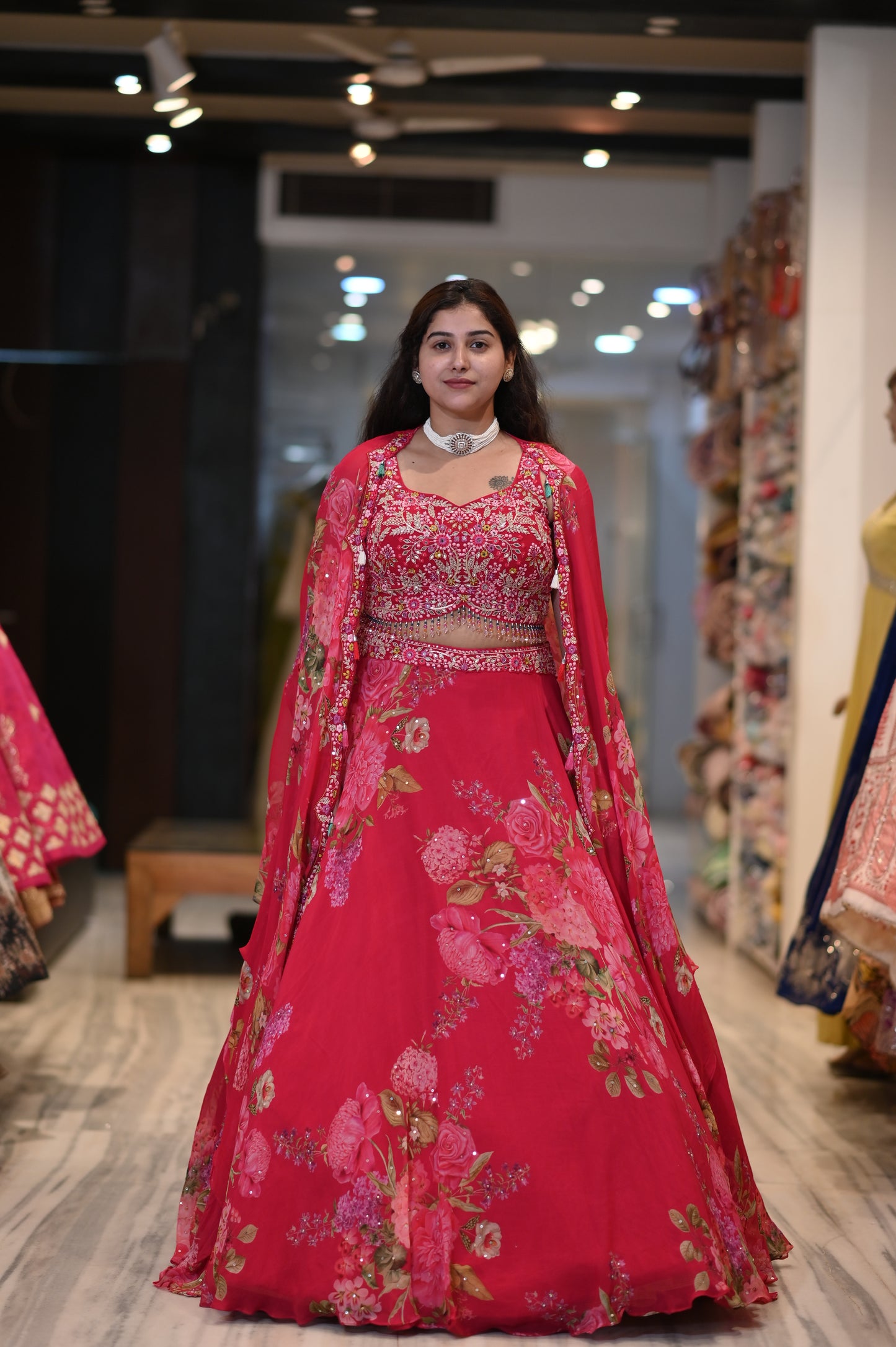 Magenta Colour Printed Organza Lehenga With Hand Embroidered Crop Top & Printed Long Shrug