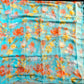 TURQUOISE COLOUR FLORAL PRINTED CHIFFON SAREE WITH PLAIN CREPE BLOUSE