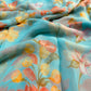 TURQUOISE COLOUR FLORAL PRINTED CHIFFON SAREE WITH PLAIN CREPE BLOUSE