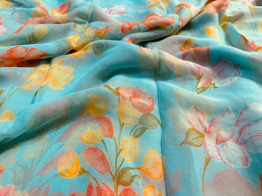 TURQUOISE COLOUR FLORAL PRINTED CHIFFON SAREE WITH PLAIN CREPE BLOUSE