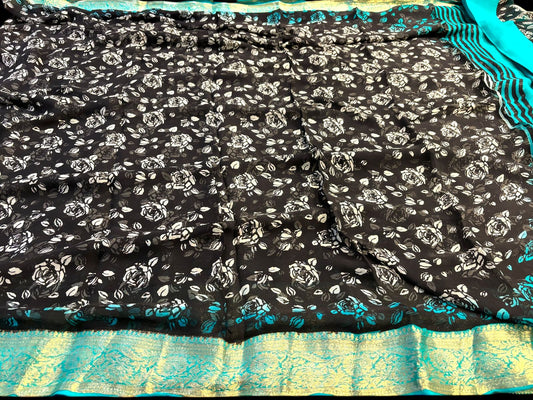 BLACK PRINTED CHIFFON SAREE WITH TURQUOISE BANARASI BROCADE BORDER & PLAIN TURQUOISE CREPE BLOUSE