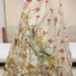 Ivory colour printed silk lehenga embellished with cutdana & sequins work