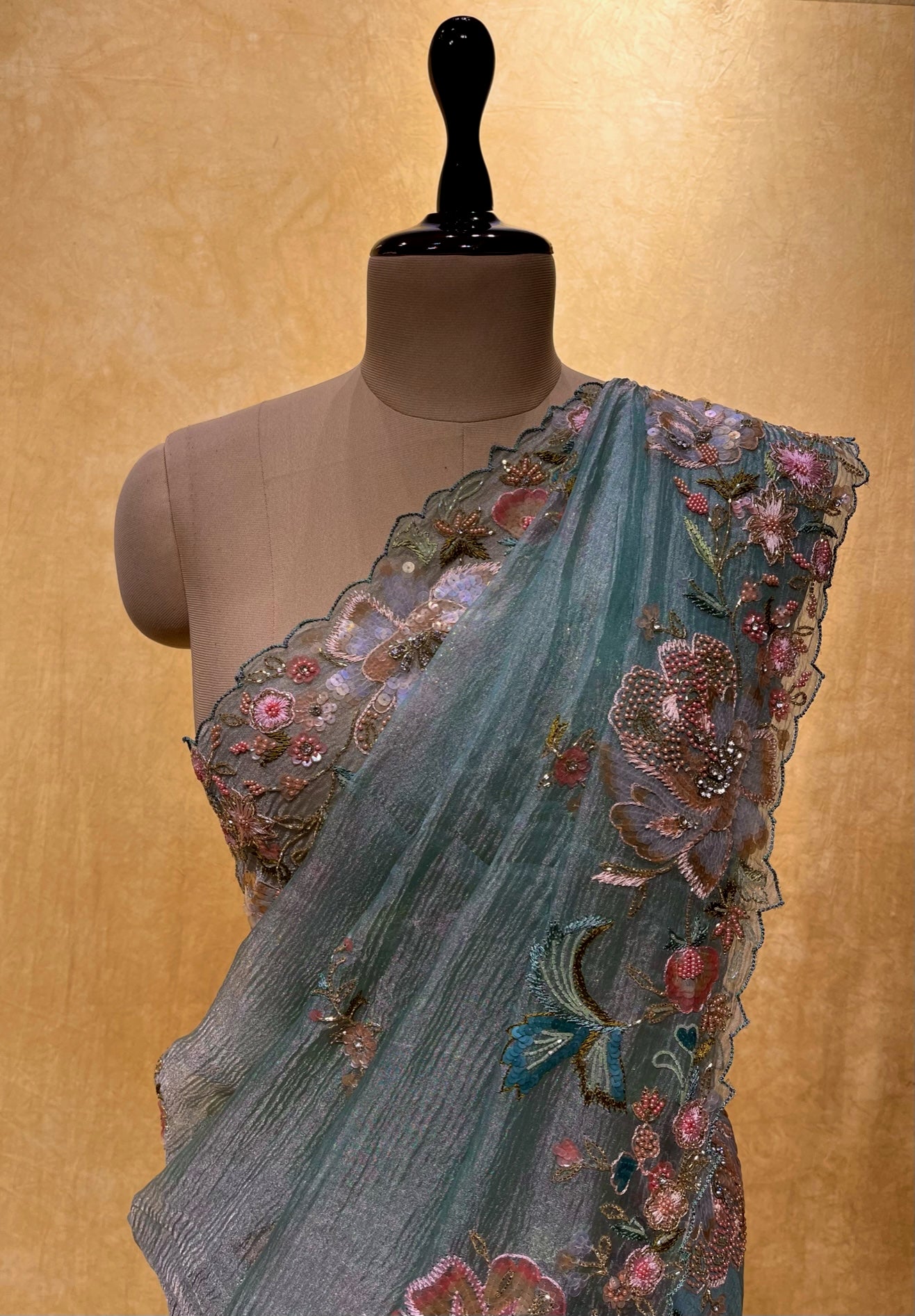 AQUA COLOUR CRUSHED TISSUE HAND EMBROIDERED SAREE EMBELLISHED WITH RESHAM, CUTDANA & SEQUINS WORK