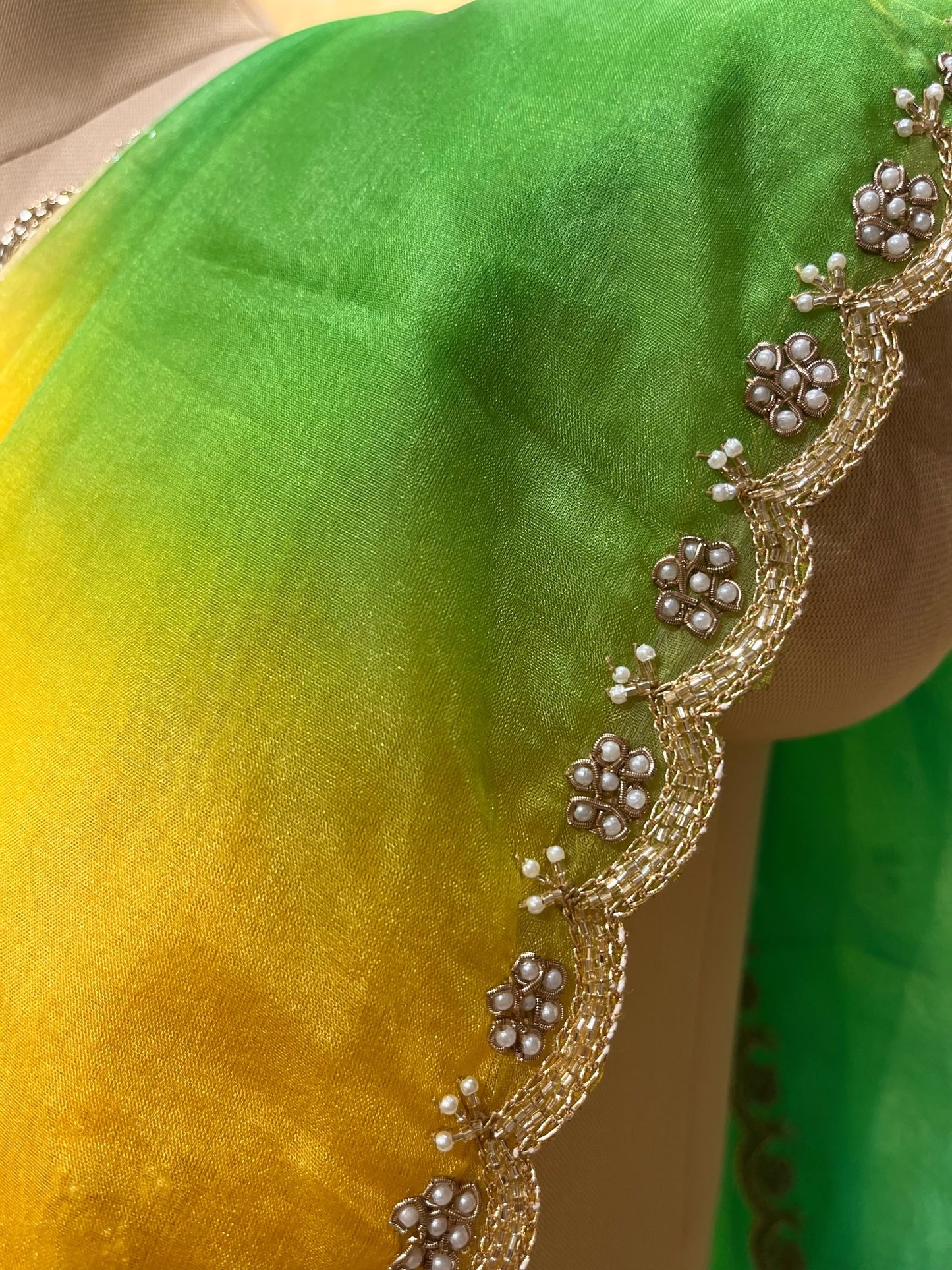 ( DELIVERY IN 25 DAYS ) GREEN & YELLOW SHADED ORGANZA SCALLOPED BORDER EMBROIDERED SAREE EMBELLISHED WITH CUTDANA & PEARL WORK
