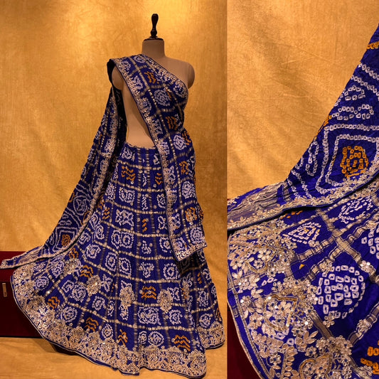 (DELIVERY IN 30 DAYS) BLUE COLOUR BANDHANI-BANDHEJ GHARCHOLA LEHENGA WITH HAND EMBROIDERED WORK