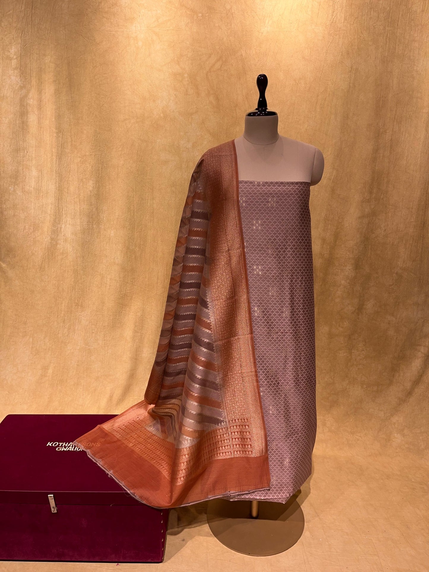 (DELIVERY IN 30 DAYS) MAUVE COLOUR CHANDERI SILK UNSTITCHED SUIT EMBELLISHED WITH ZARI WEAVES