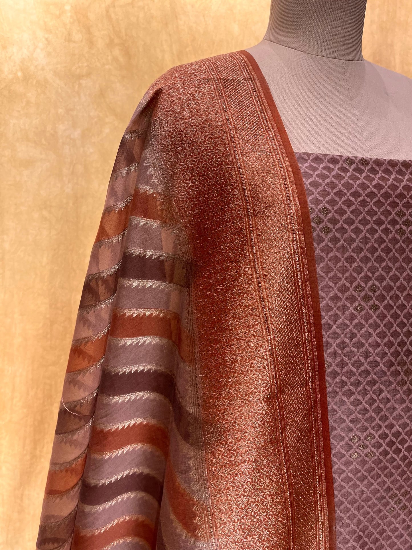 (DELIVERY IN 30 DAYS) MAUVE COLOUR CHANDERI SILK UNSTITCHED SUIT EMBELLISHED WITH ZARI WEAVES