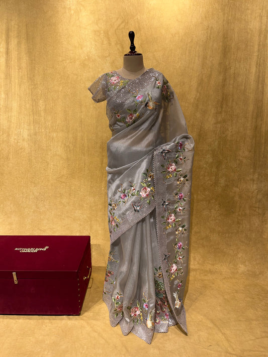 GREY COLOUR SAREE WITH READYMADE BLOUSE DESIGNED IN IMPORTED FABRIC WITH PERSIAN EMBROIDERY & LACE BORDER
